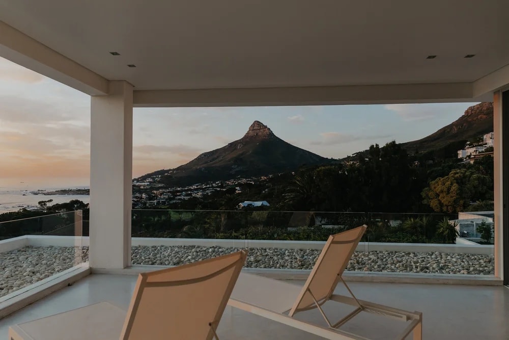 The covered terrace at dusk, Lion's Head standing across the bay